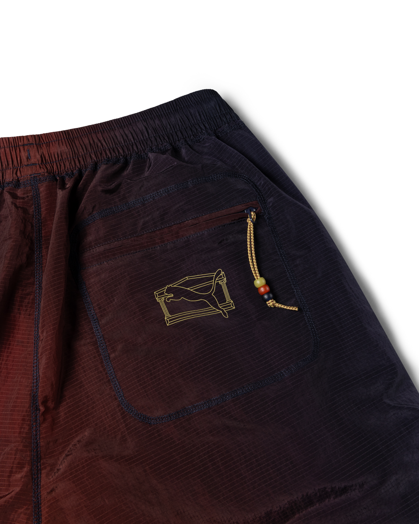 puma x aries ombre nylon laced pants