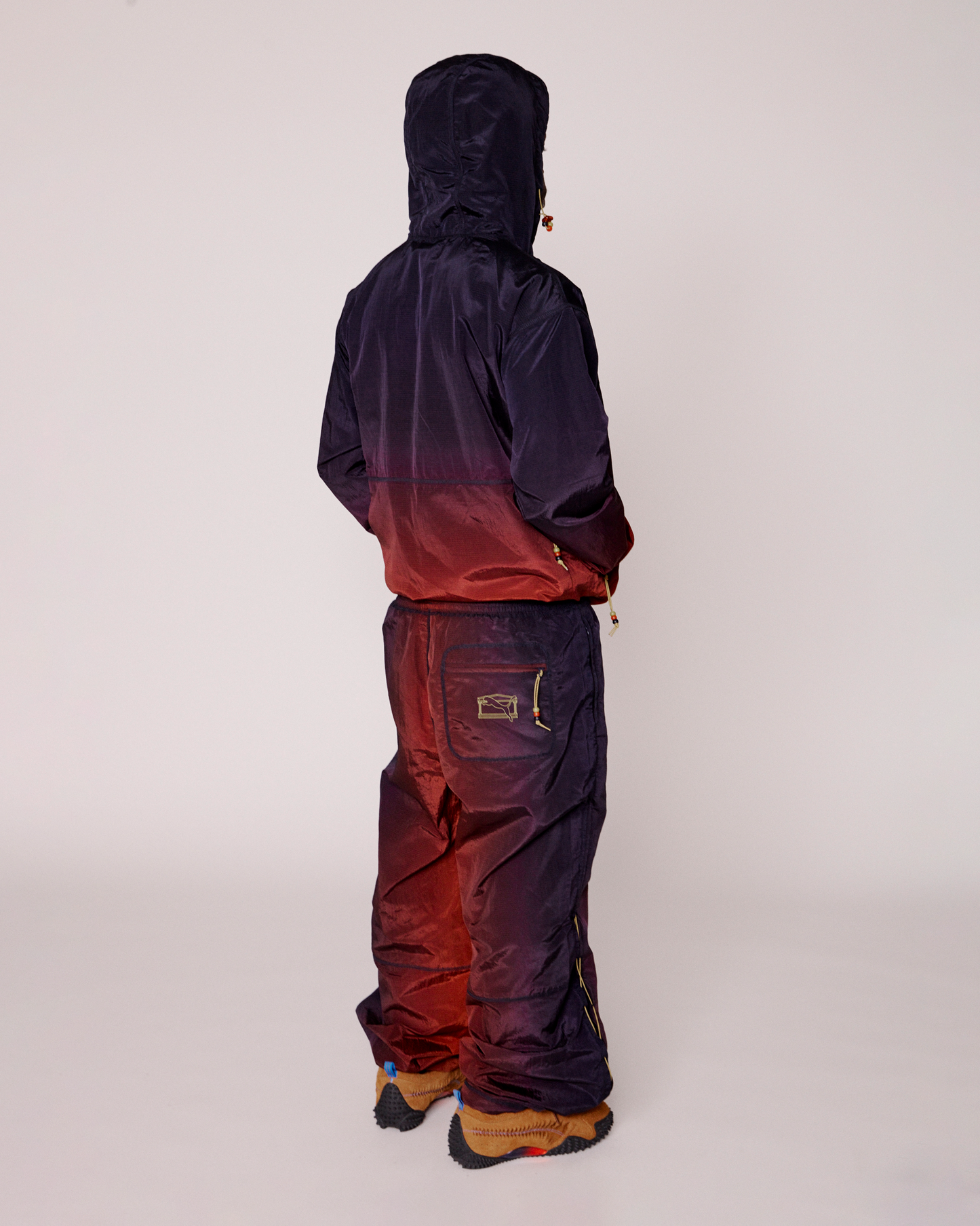 puma x aries ombre nylon laced pants