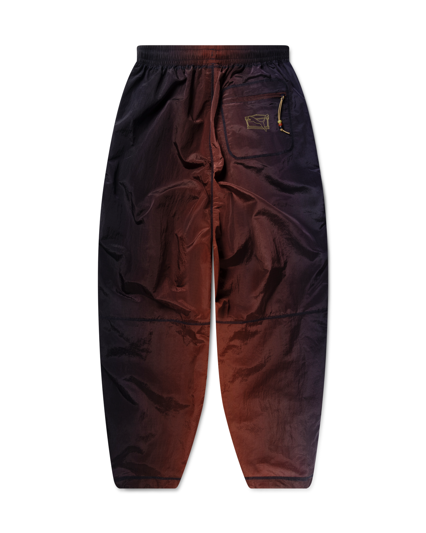 puma x aries ombre nylon laced pants